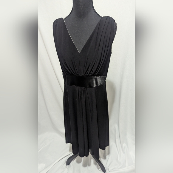 black dress with spaghetti straps Front Buttoned Long – Blossom Studio Size:US 24 Cider black mini dress Ruffles Sleeve